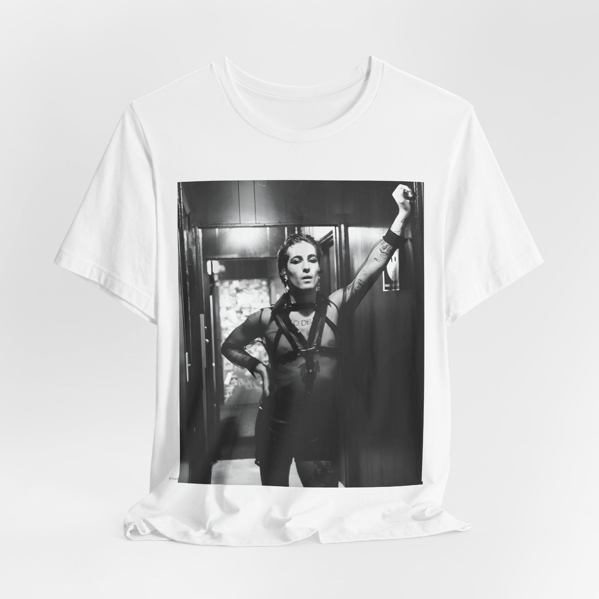 A black graphic t-shirt featuring a graphic of Maneskin emphasizing a rebel rock spirit.