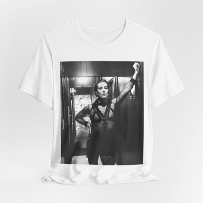 A black graphic t-shirt featuring a graphic of Maneskin emphasizing a rebel rock spirit.