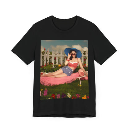 A black graphic t-shirt featuring a graphic related to Katy Perry's "California Gurls" song, with beach vibes.
