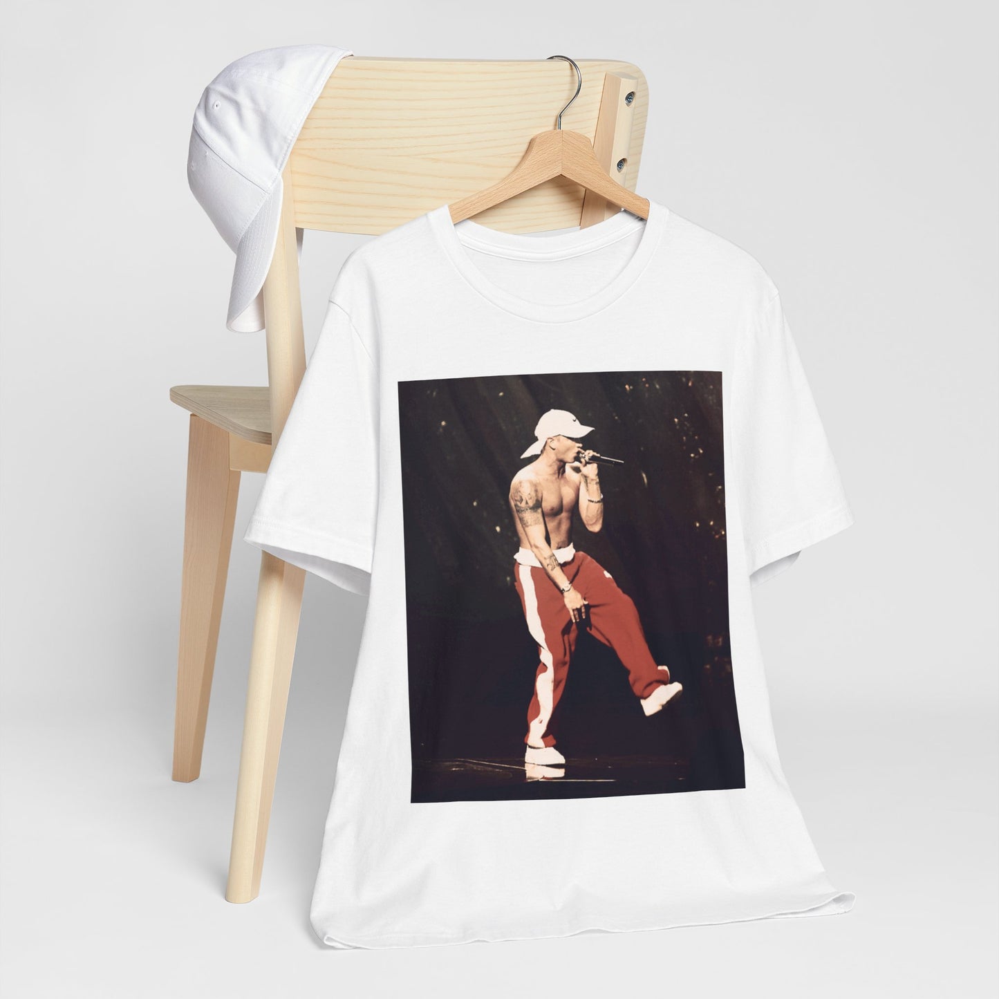 A black graphic t-shirt featuring a graphic inspired by Eminem's film '8 Mile'.
