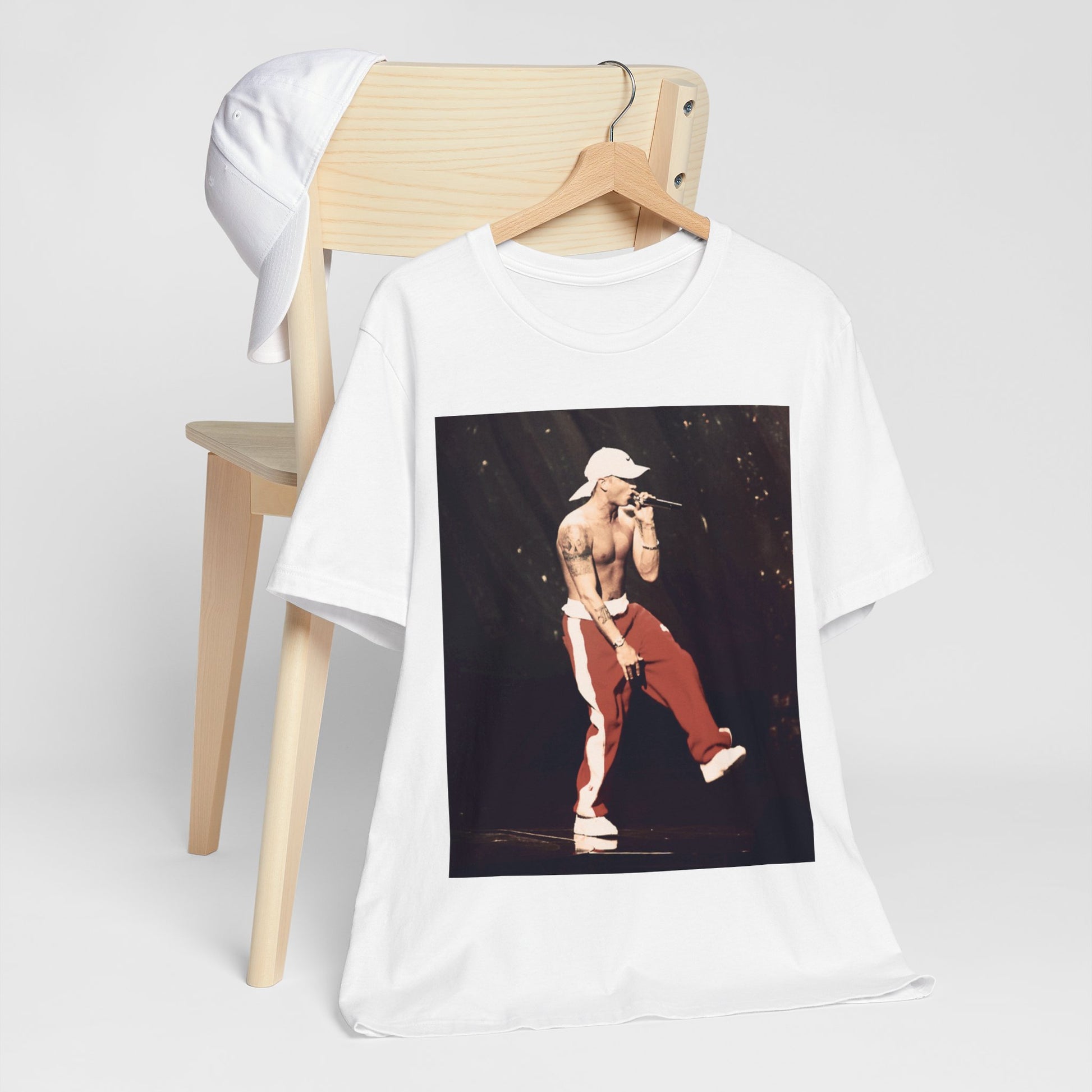 A black graphic t-shirt featuring a graphic inspired by Eminem's film '8 Mile'.