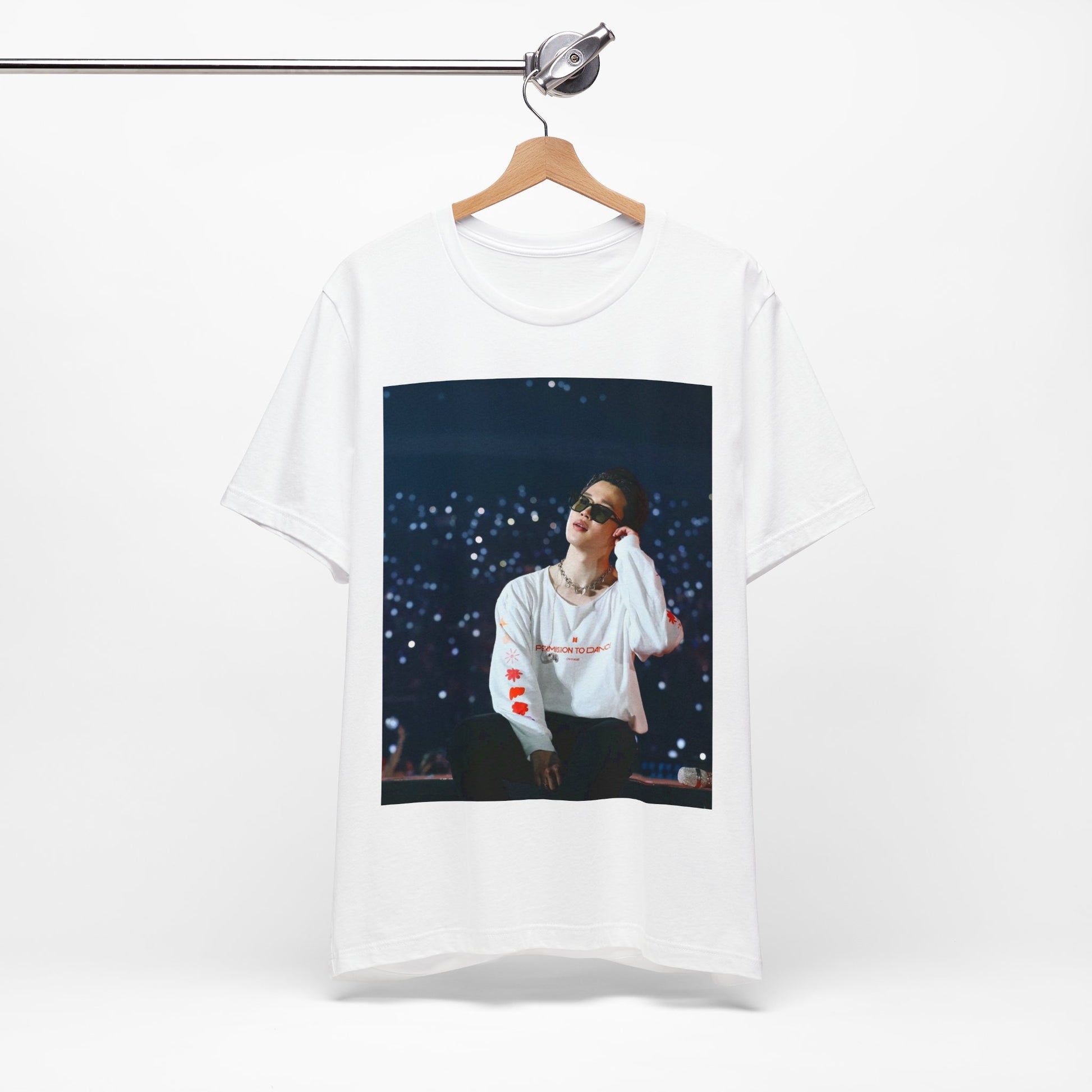 A black graphic t-shirt featuring a vintage aesthetic graphic related to Jimin's 'Lie' era.