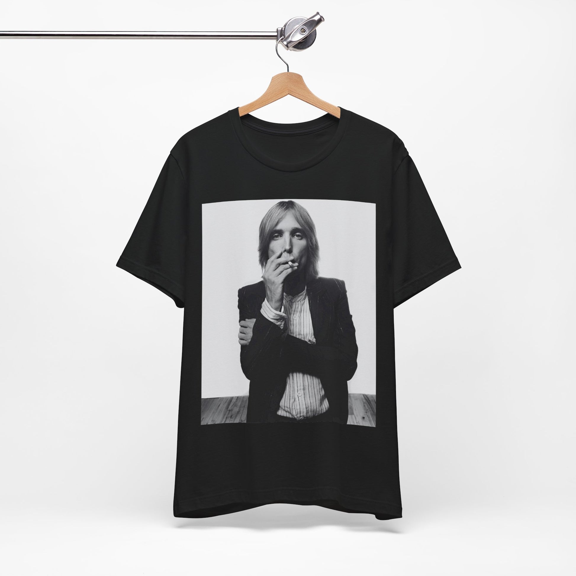 A black graphic t-shirt featuring a black and white graphic or photo of Tom Petty as a Southern rock icon.