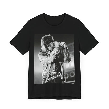 A black graphic t-shirt featuring a vintage graphic related to The Strokes' 'Last Nite' song or era.