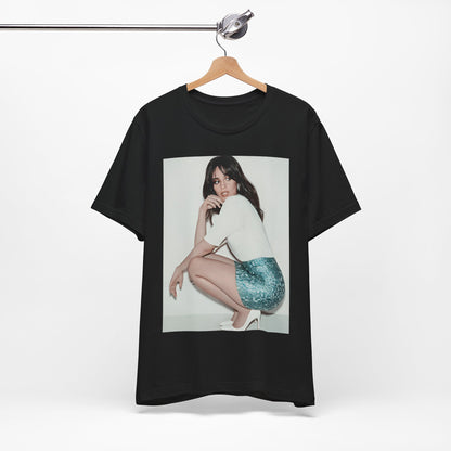 A black graphic t-shirt featuring a stylized graphic of Camila Cabello as a Latin pop princess.