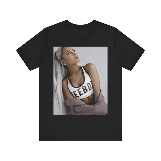 A black graphic t-shirt featuring an artistic or aesthetic graphic of Ariana Grande.