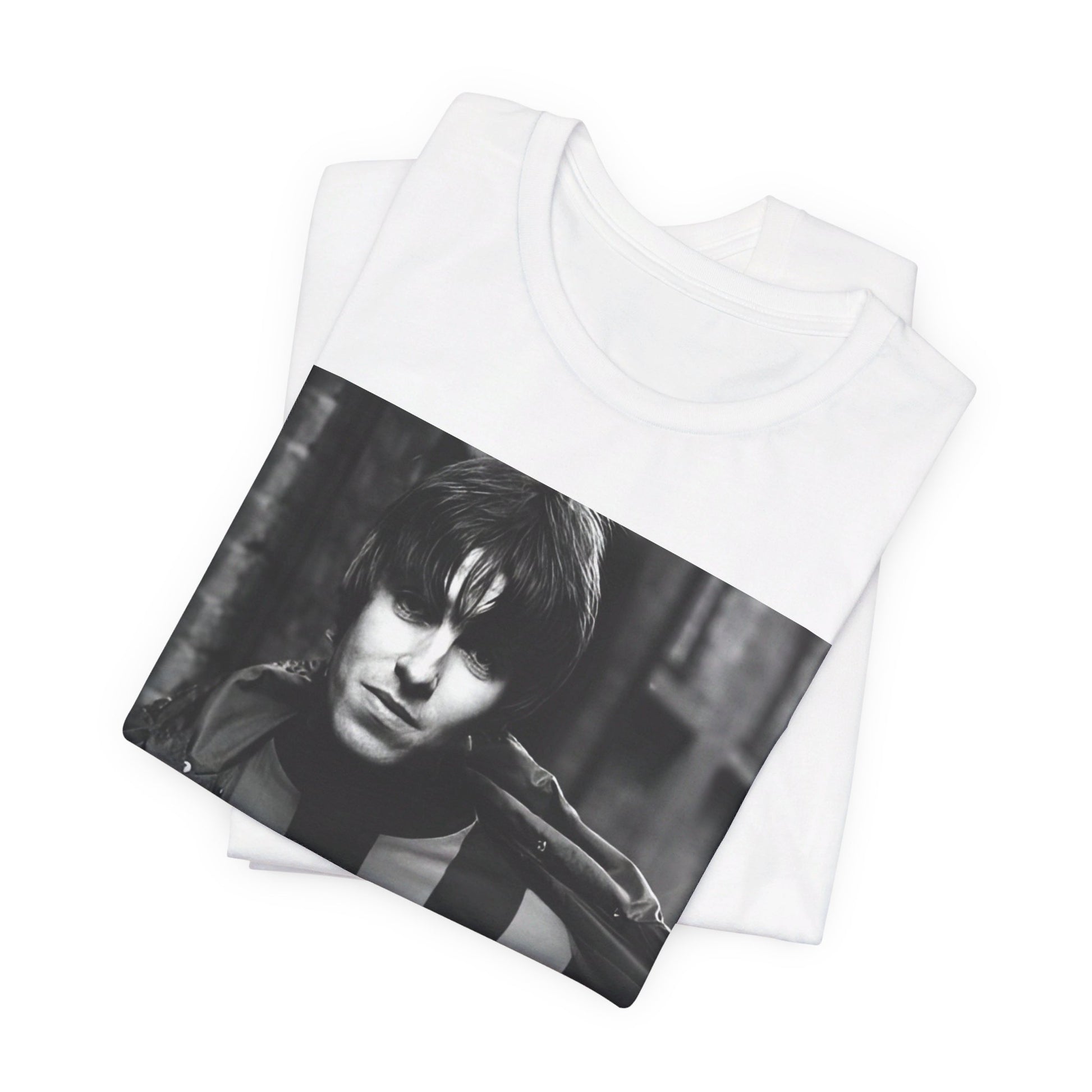 A black graphic t-shirt featuring a photo of Liam Gallagher from Oasis, showing his support for Manchester City.