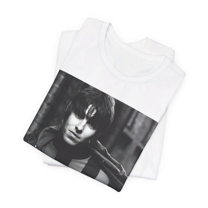 A black graphic t-shirt featuring a photo of Liam Gallagher from Oasis, showing his support for Manchester City.