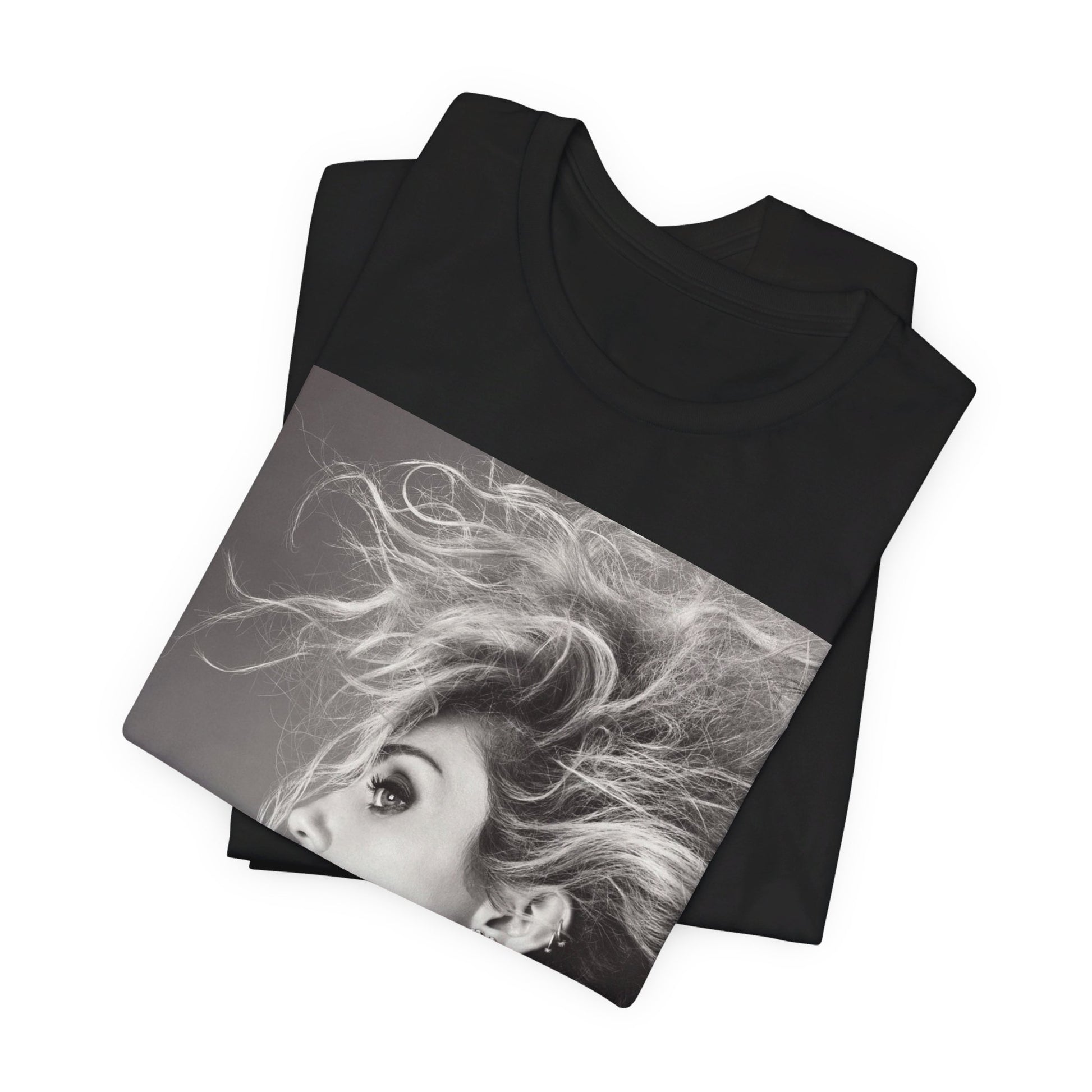 A black graphic t-shirt featuring a graphic of Miley Cyrus as a grunge rockstar.