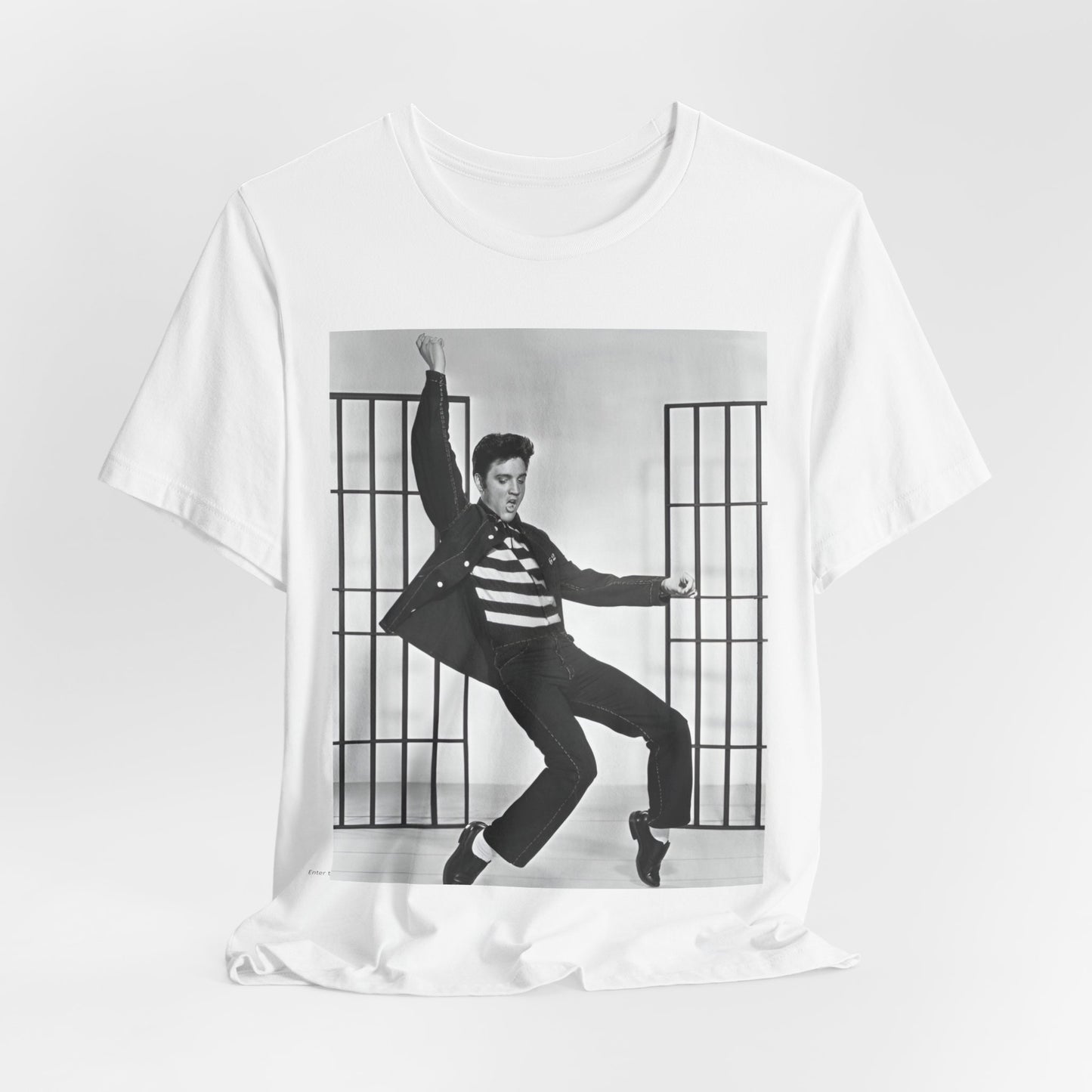 A black graphic t-shirt featuring a graphic related to Elvis Presley's 'Jailhouse Rock' song.