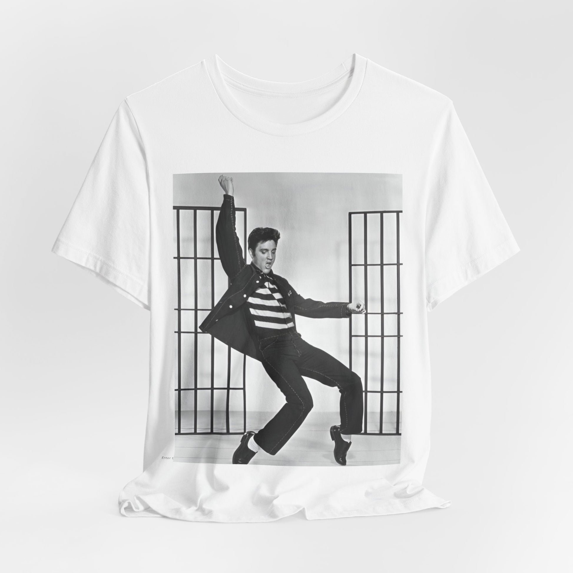 A black graphic t-shirt featuring a graphic related to Elvis Presley's 'Jailhouse Rock' song.