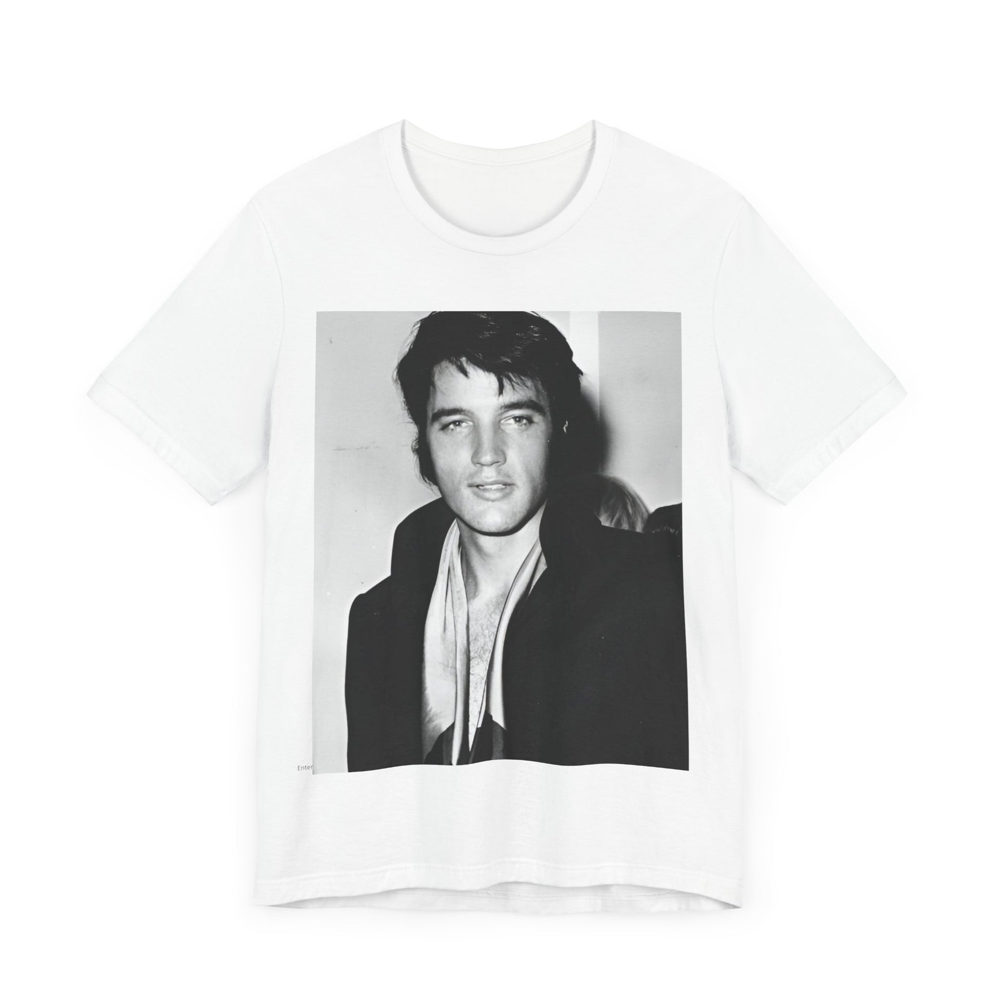 A black graphic t-shirt featuring a black and white rock and roll portrait photo of Elvis Presley.