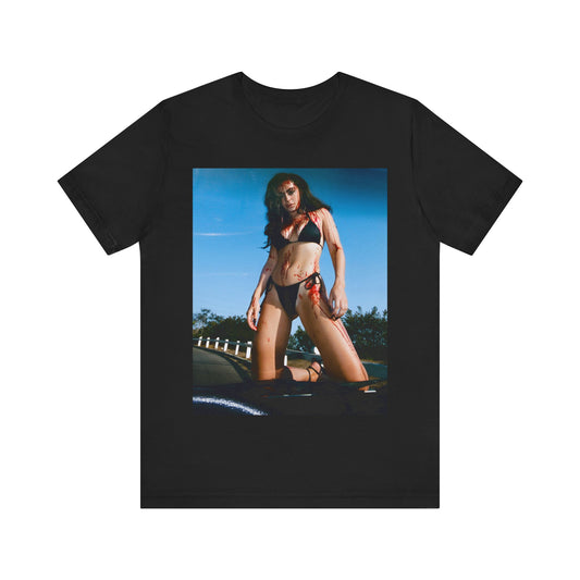 A black graphic t-shirt featuring the album cover art for Charli XCX's 'CRASH' album.