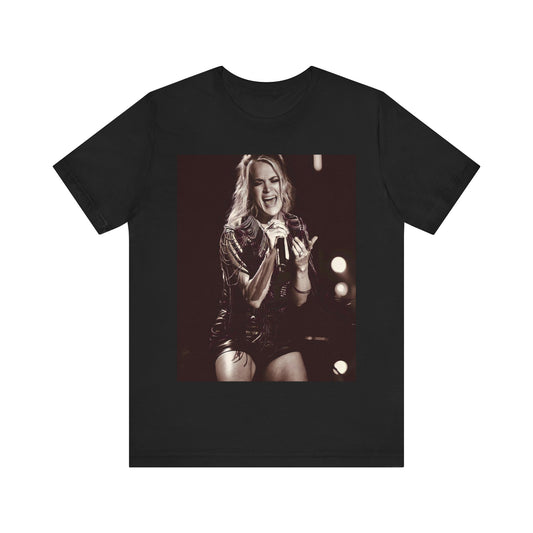 A black graphic t-shirt featuring a striking black and white photo portrait of Carrie Underwood.