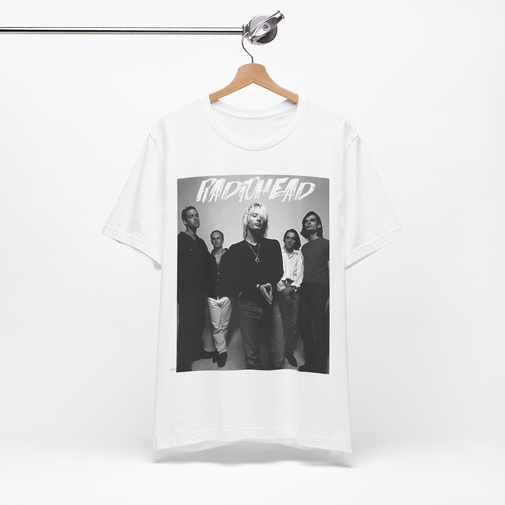 A black graphic t-shirt featuring a retro graphic related to Radiohead's 'OK Computer' album era.