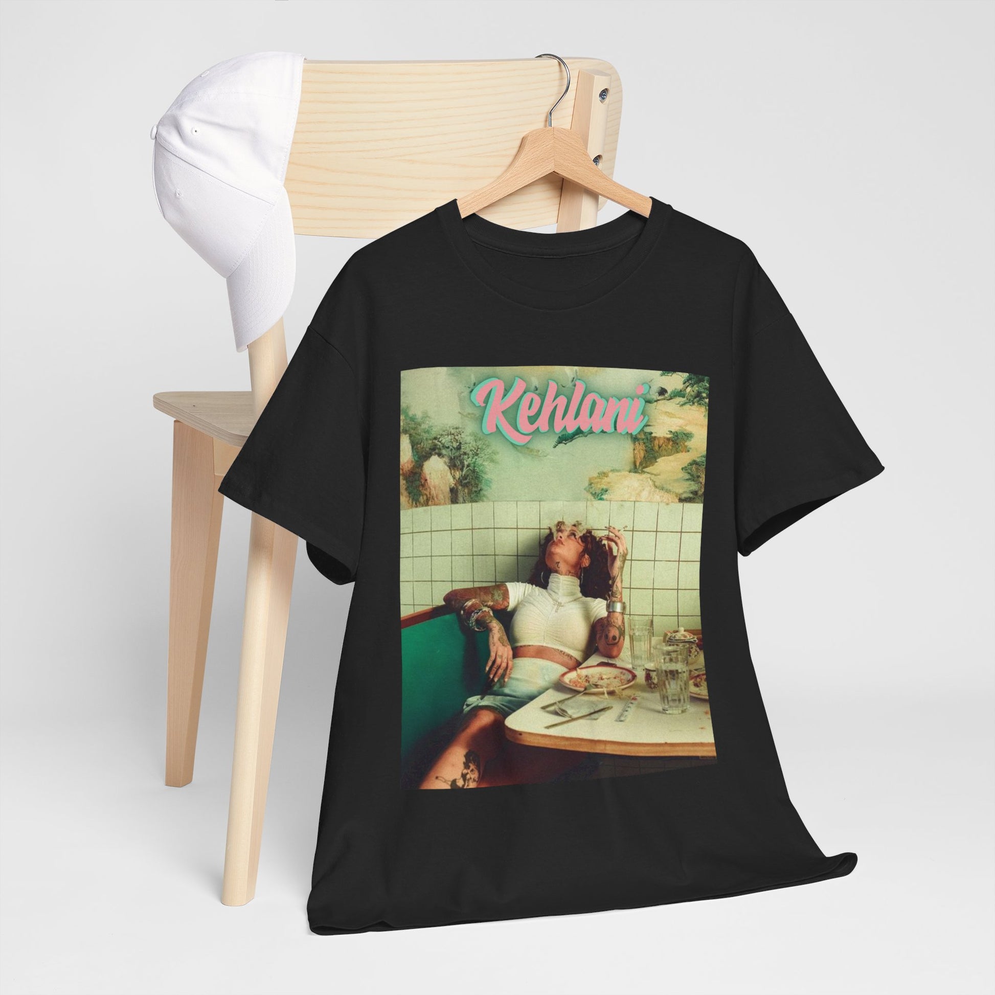 A black graphic t-shirt featuring a cool alt R&B artist graphic of Kehlani.