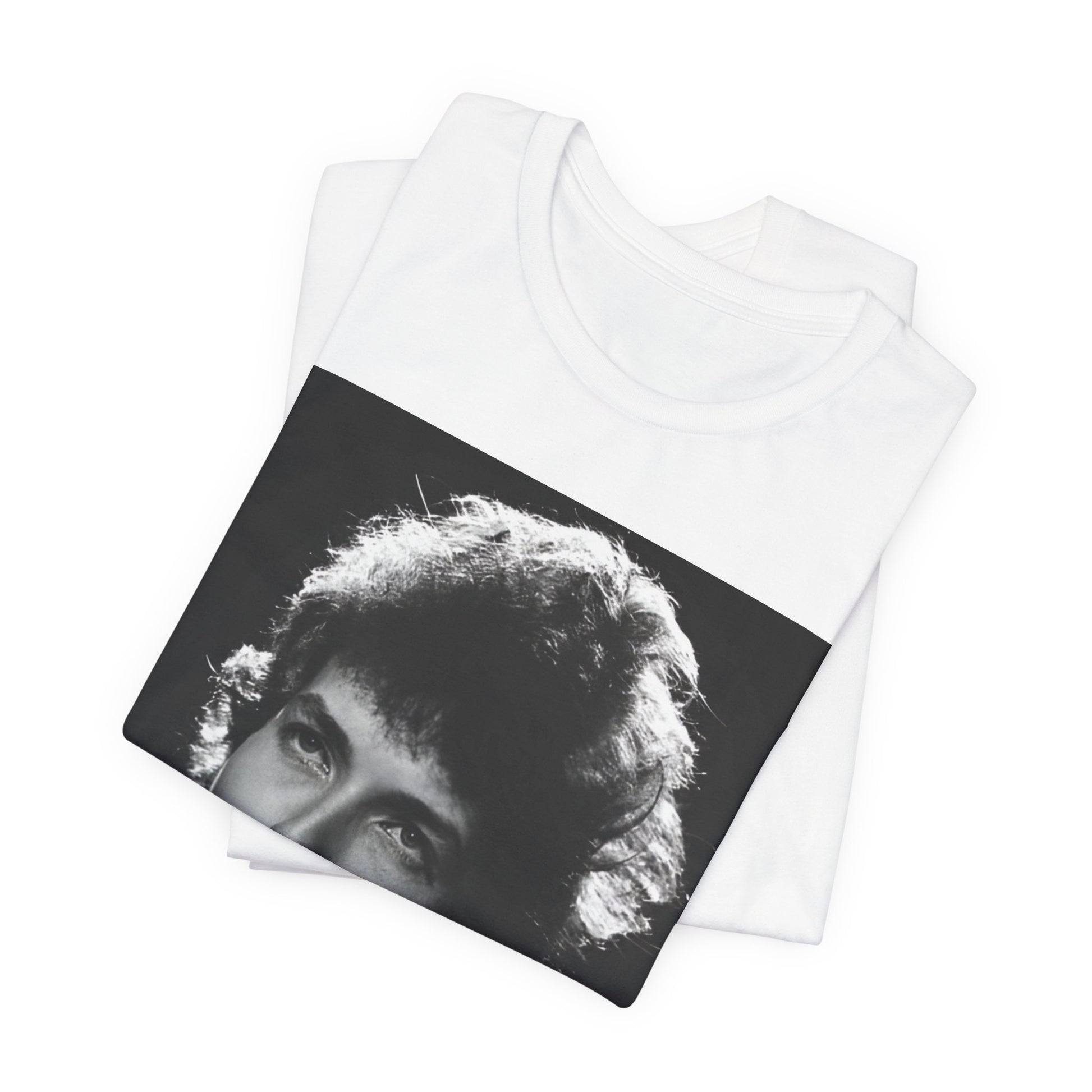 A black graphic t-shirt featuring a graphic of Bob Dylan from the 60s playing his harmonica.