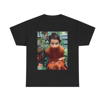 A black graphic t-shirt featuring a dynamic and 'fierce' graphic of Bjork, emphasizing her strong and confident presence.