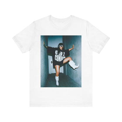 A black graphic t-shirt featuring a modern pop essential graphic of Rihanna.
