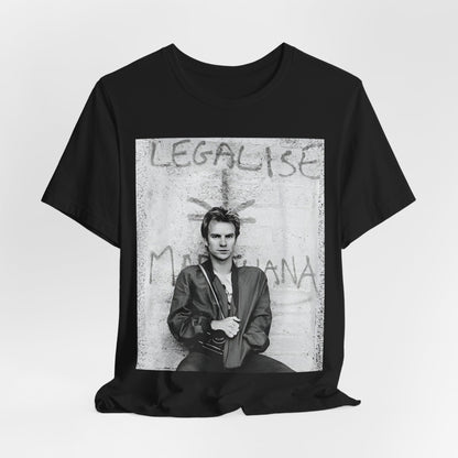 A black graphic t-shirt featuring a graphic of The Police with reggae-influenced pop elements.