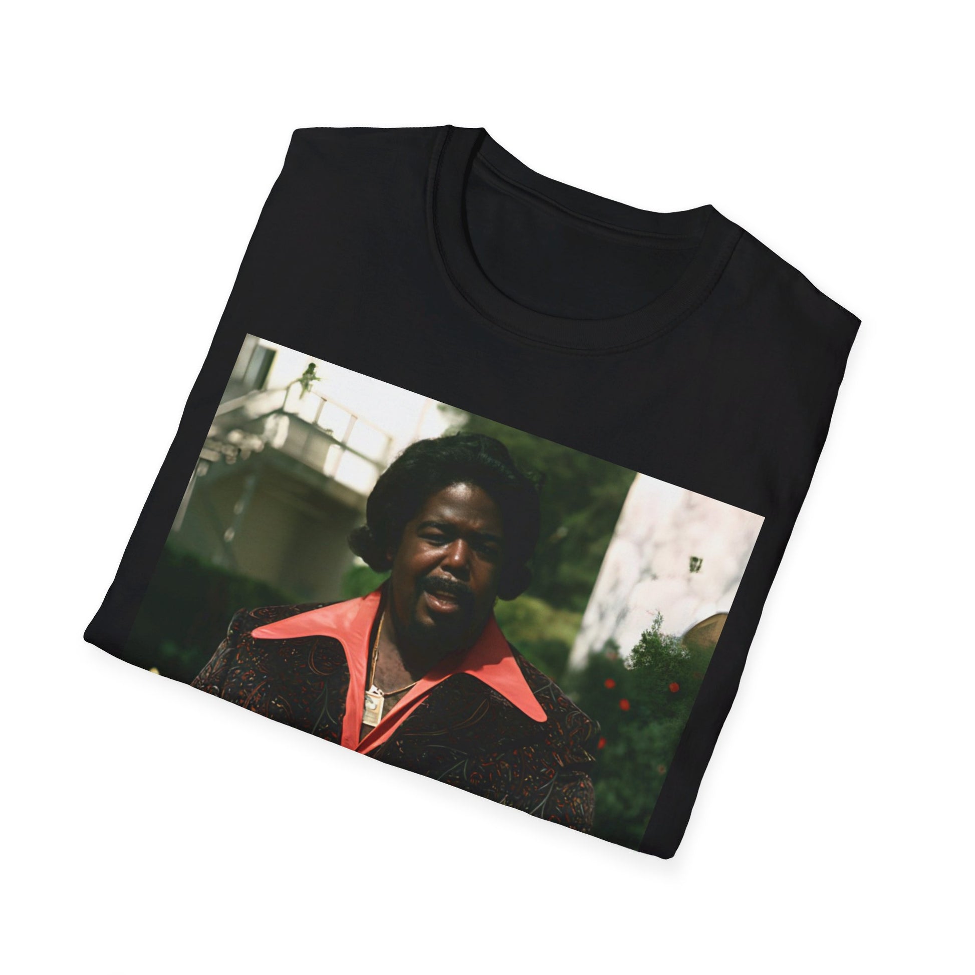 A black graphic t-shirt featuring a graphic of Barry White, emphasizing his romantic and soulful presence from the 1970s.