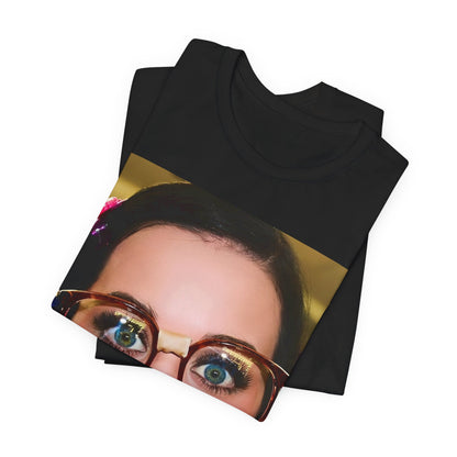 A black graphic t-shirt featuring a graphic related to Katy Perry's "I Kissed A Girl" song or era.