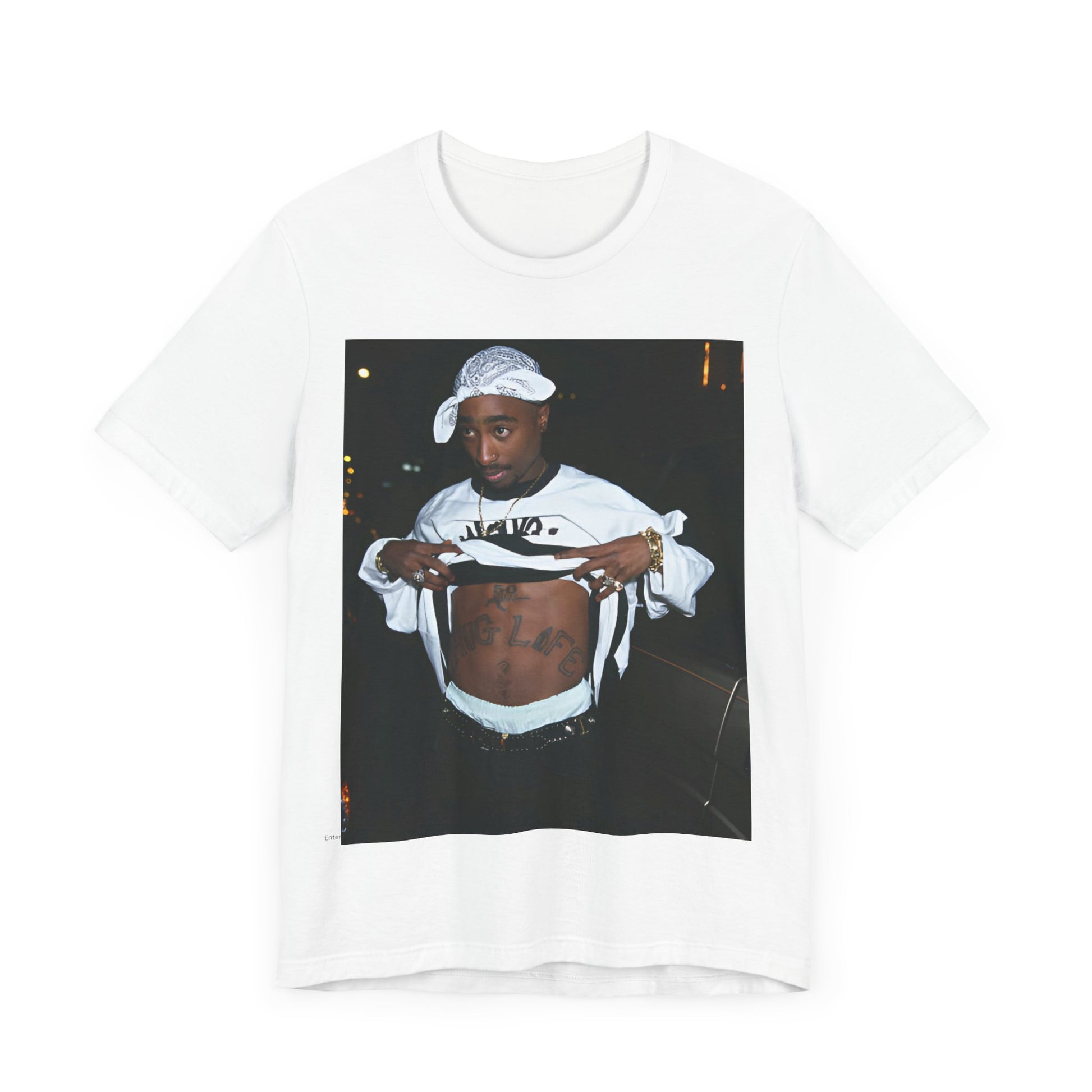 A black graphic t-shirt featuring a graphic of Tupac Shakur (2Pac).