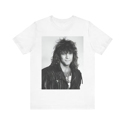 A black graphic t-shirt featuring a black and white photo of Bon Jovi from a 90s tour, performing on stage.