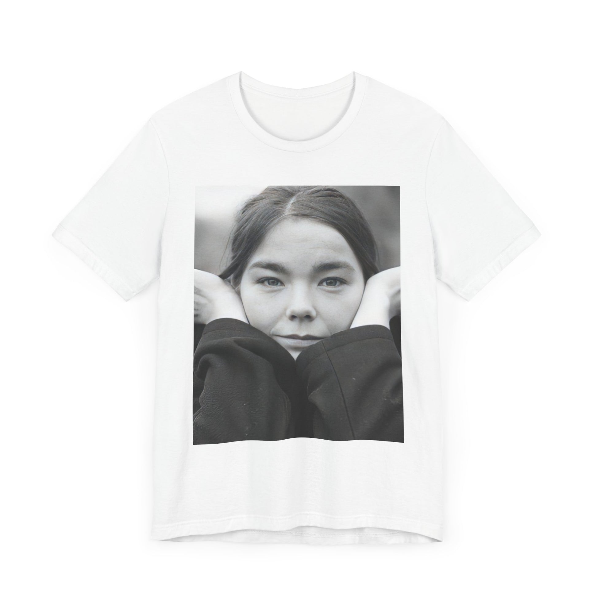 A black graphic t-shirt featuring a black and white portrait photo of Bjork.