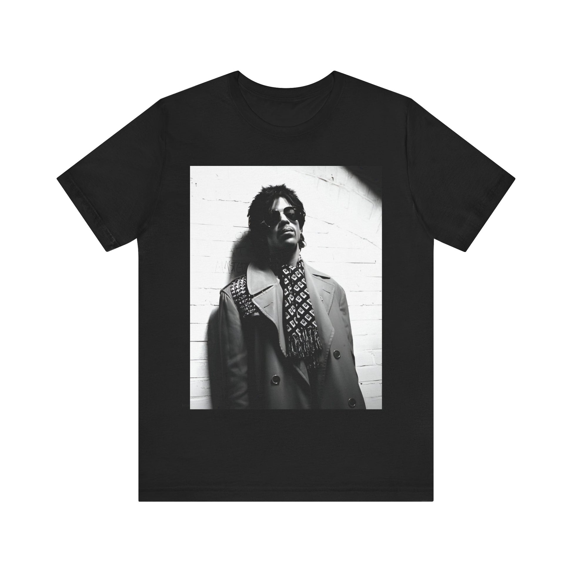 A black graphic t-shirt featuring Prince's iconic symbol, representing 'The Artist Formerly Known As'.