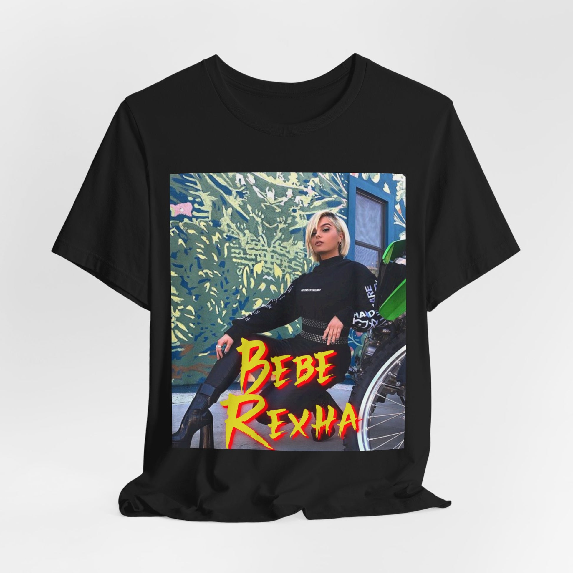 A black graphic t-shirt featuring a vintage pop aesthetic graphic of Bebe Rexha.