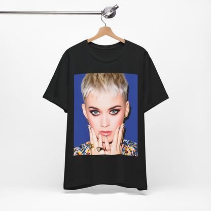 A black graphic t-shirt featuring a graphic of Katy Perry as a global pop phenomenon.