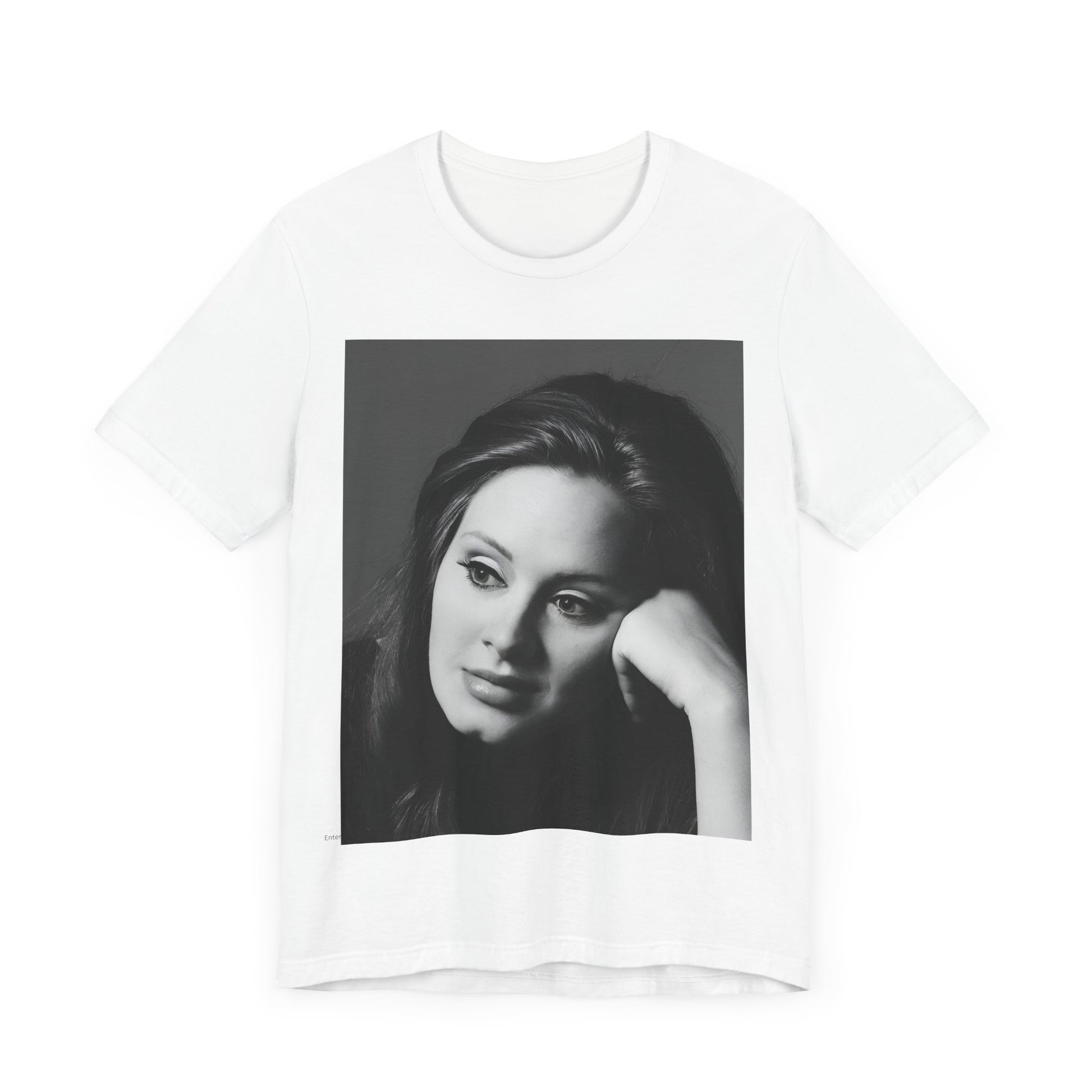 A black graphic t-shirt featuring a vintage-style black and white studio portrait of Adele, showing her with a poised and elegant expression.