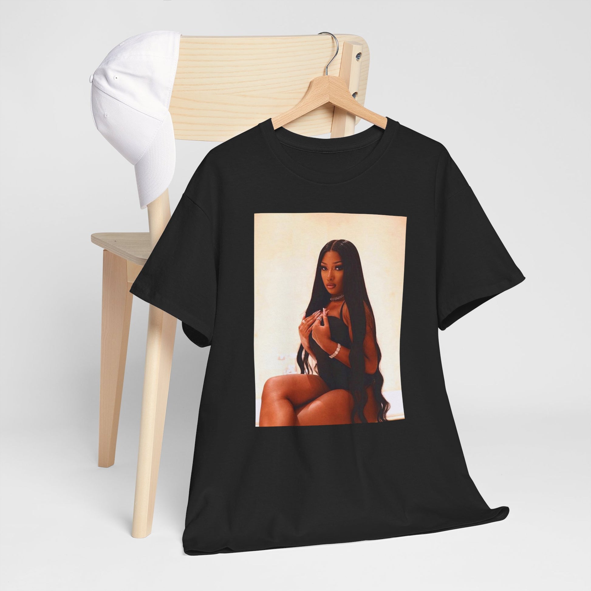 A black graphic t-shirt featuring a graphic of Megan Thee Stallion as the Queen of Rap.
