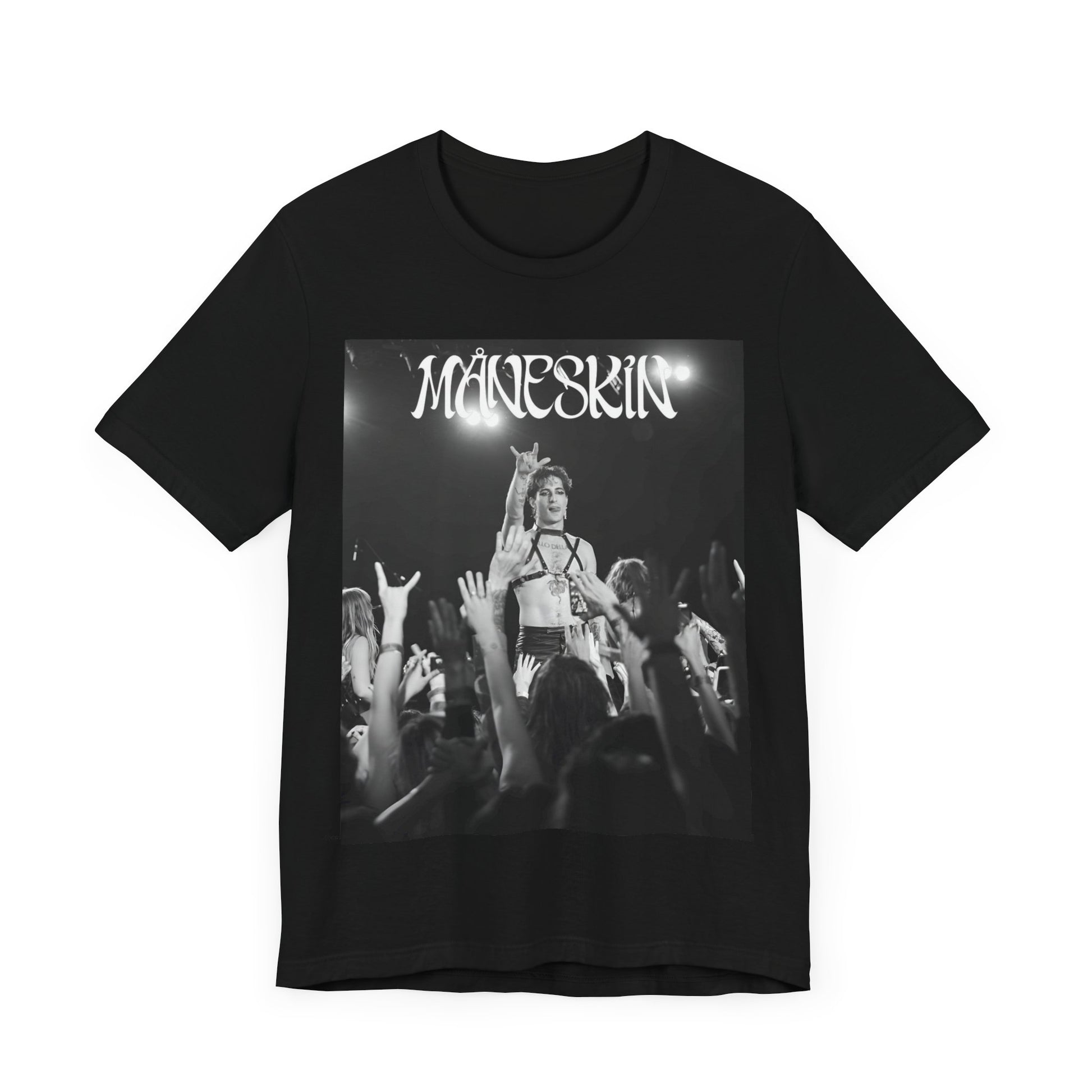 A black graphic t-shirt featuring a graphic or photo of Maneskin performing live.