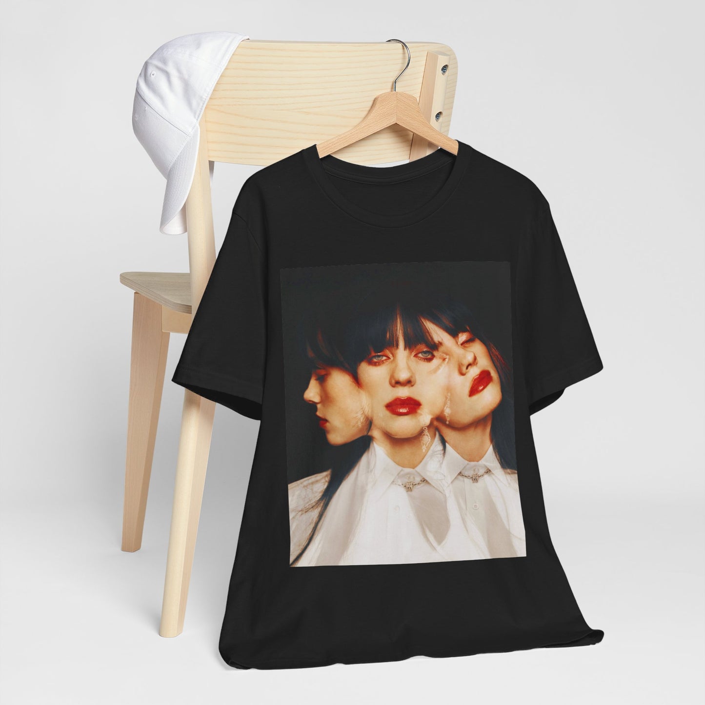 A classic, glamorous portrait of Billie Eilish as a pop star, with blonde hair and a confident gaze, printed on a t-shirt.