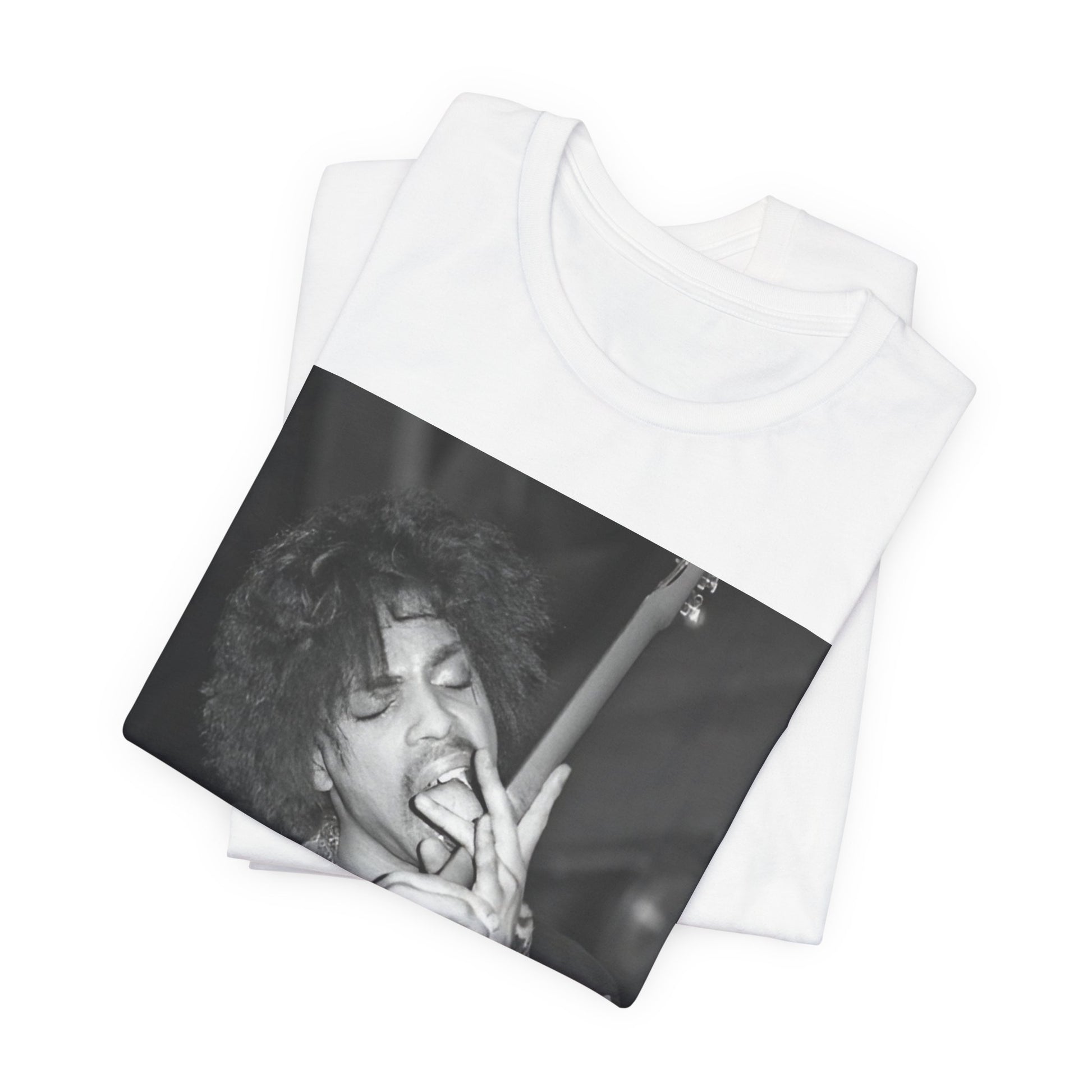 A black graphic t-shirt featuring a graphic or photo of Prince performing wildly on stage.