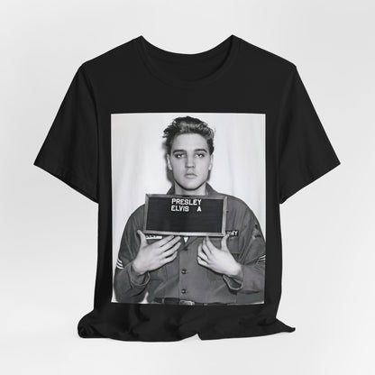 A black graphic t-shirt featuring a retro mugshot photo of Elvis Presley.