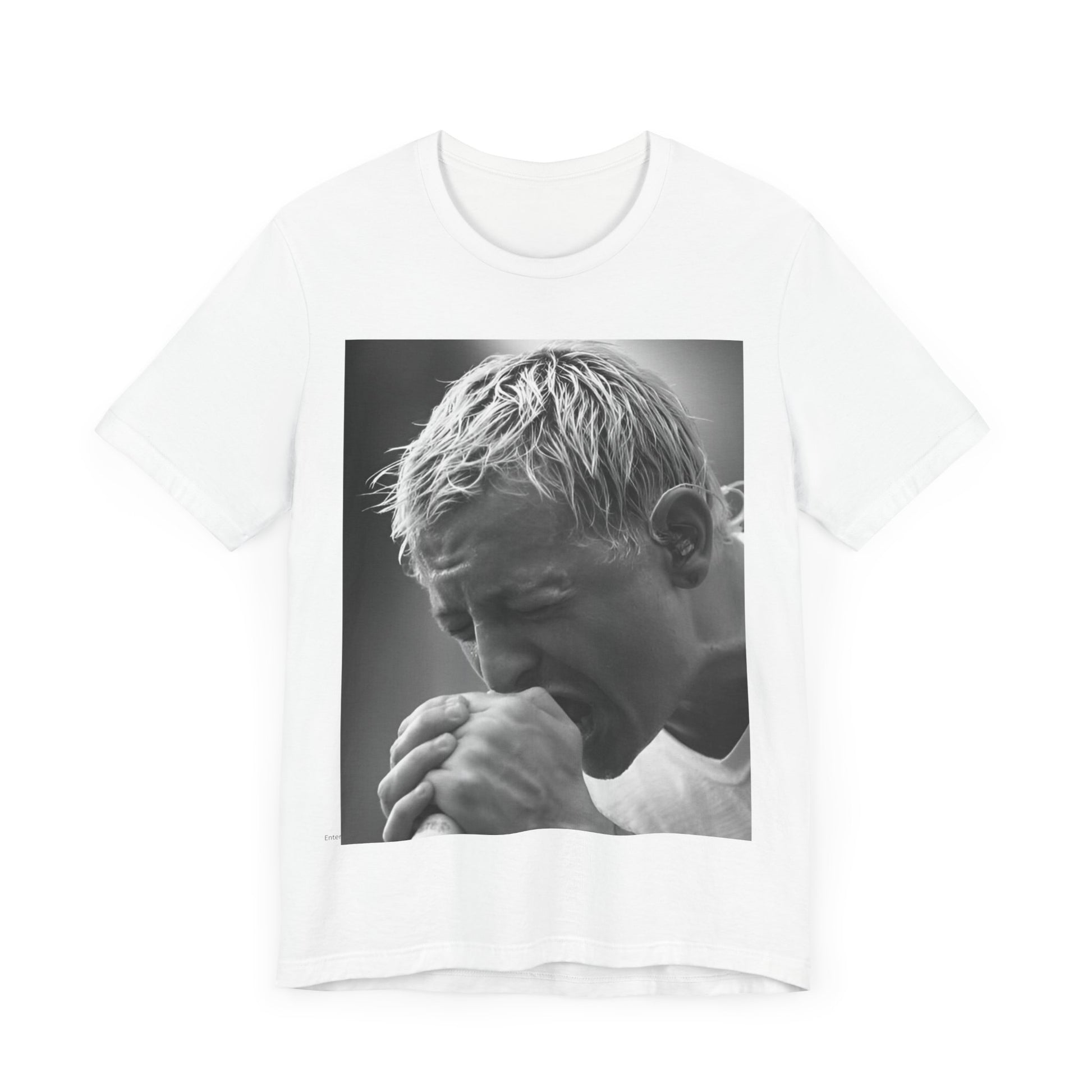 A black graphic t-shirt featuring a graphic or photo of Chester Bennington from Linkin Park performing live on stage.