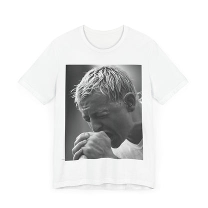 A black graphic t-shirt featuring a graphic or photo of Chester Bennington from Linkin Park performing live on stage.