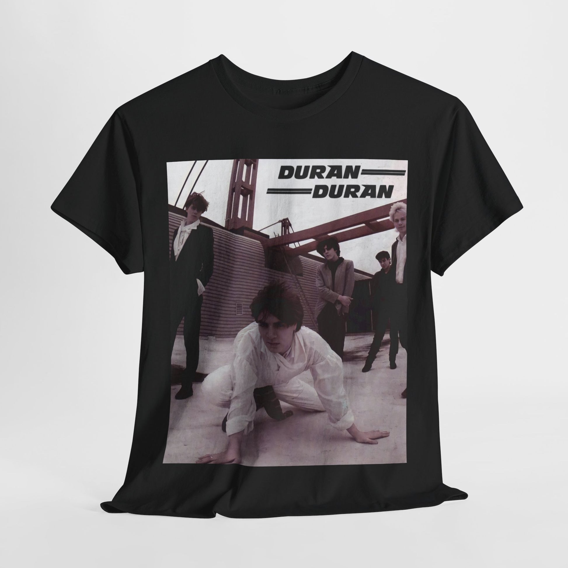 A black graphic t-shirt featuring a graphic related to Duran Duran's 'Hungry Like the Wolf' song or era.