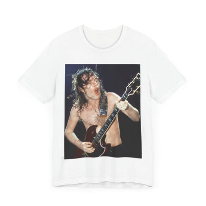 A graphic of AC/DC's lead guitarist, Angus Young, performing with high energy live on stage, printed on a t-shirt.