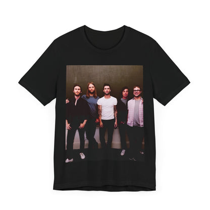 A black cotton Maroon 5 t-shirt featuring a graphic of an artistic, emotional heart design.
