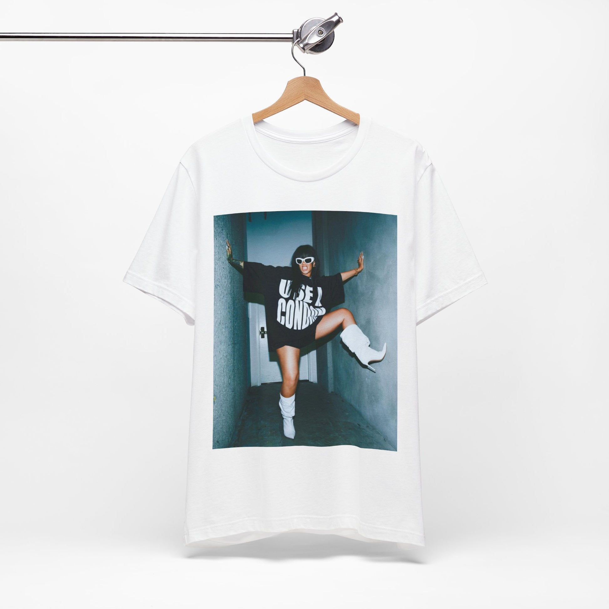 A black graphic t-shirt featuring a modern pop essential graphic of Rihanna.