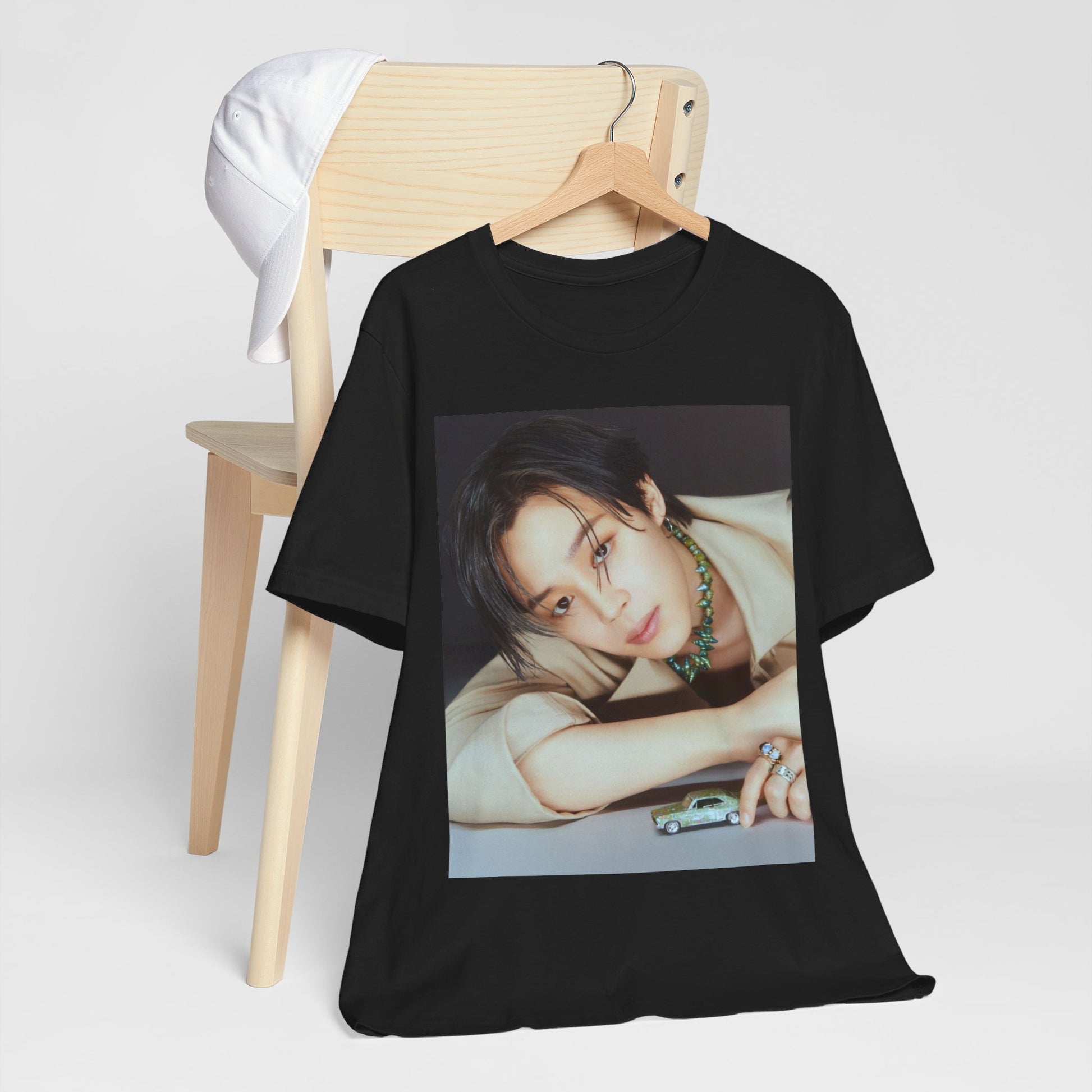 A black graphic t-shirt featuring a retro graphic related to Jimin's 'Filter' era.