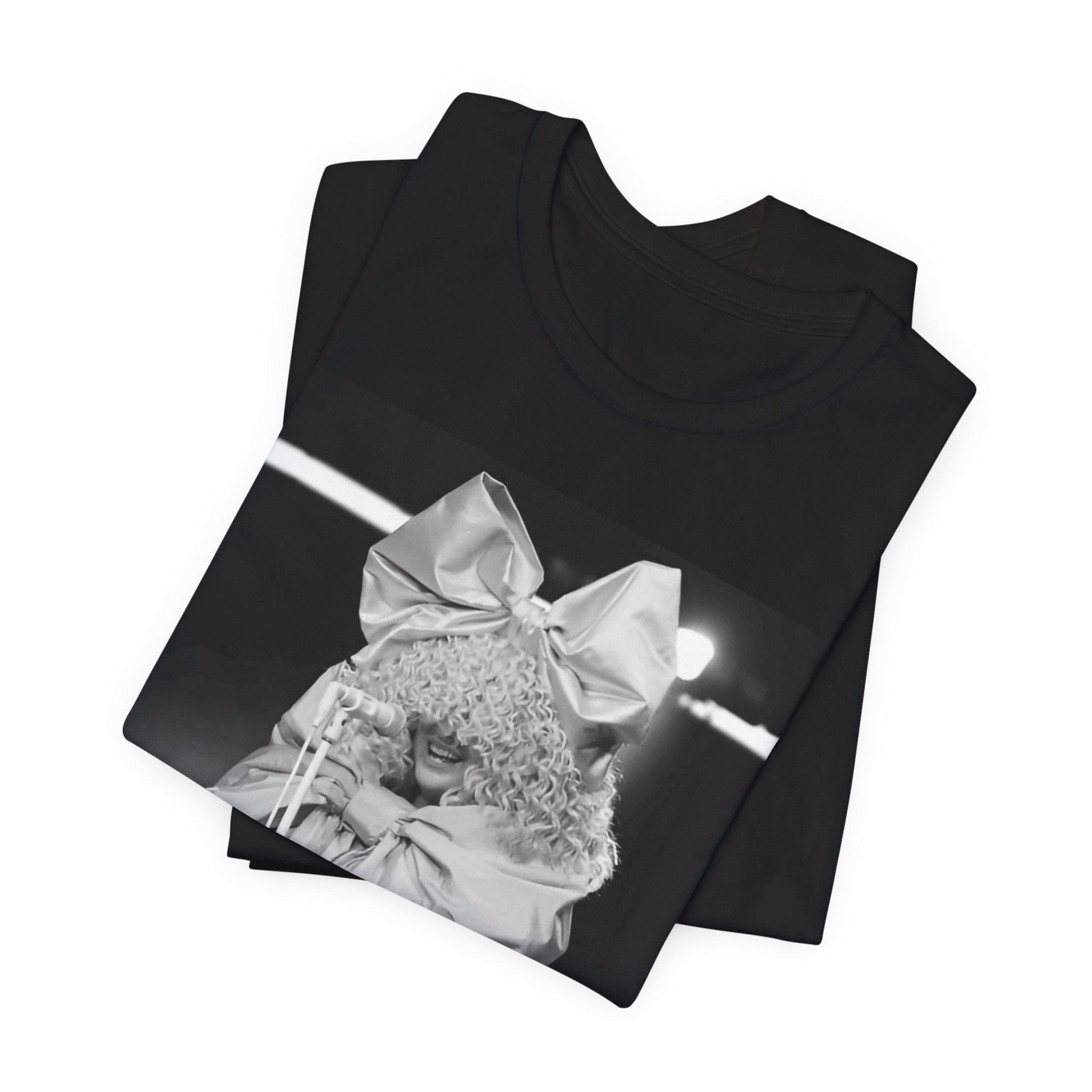A black graphic t-shirt featuring a black and white, monochrome graphic or photo of Sia.