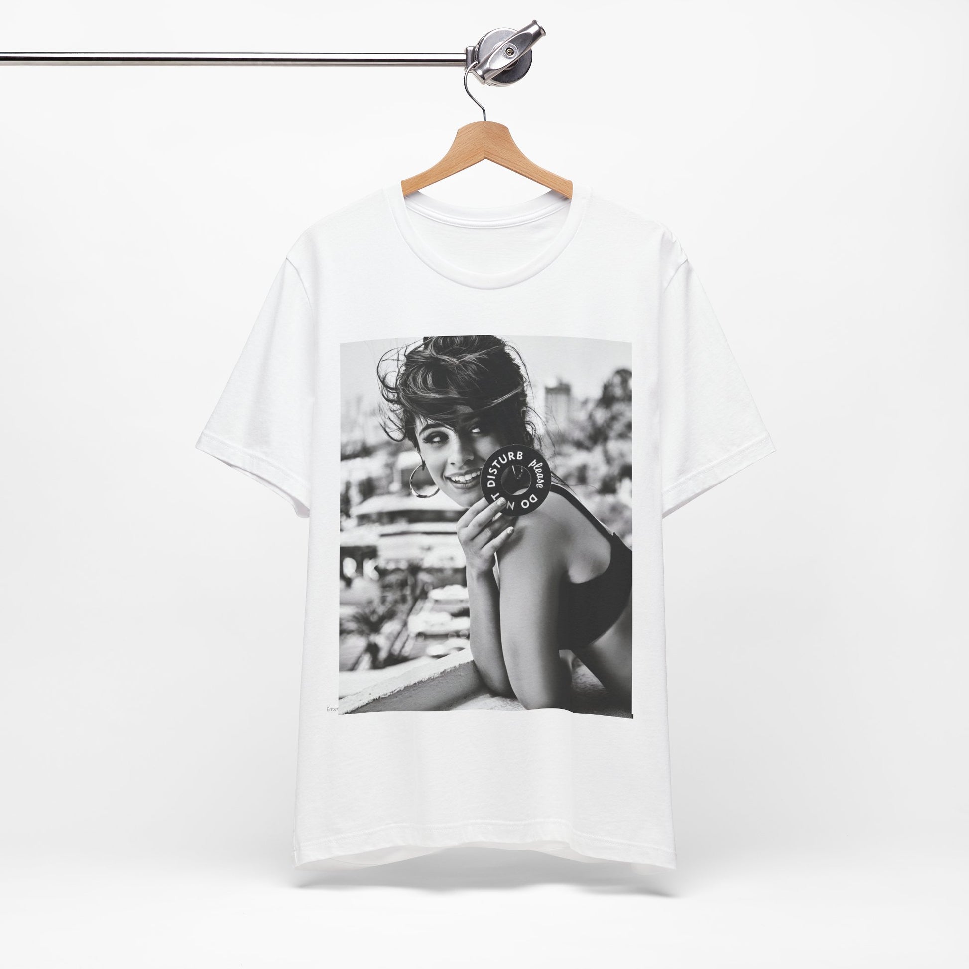 A black graphic t-shirt featuring a black and white photo or graphic of Camila Cabello in an iconic style.