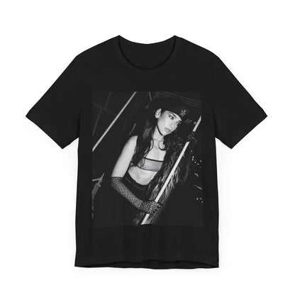 A black graphic t-shirt featuring a black and white, monochrome graphic or portrait of Dua Lipa.