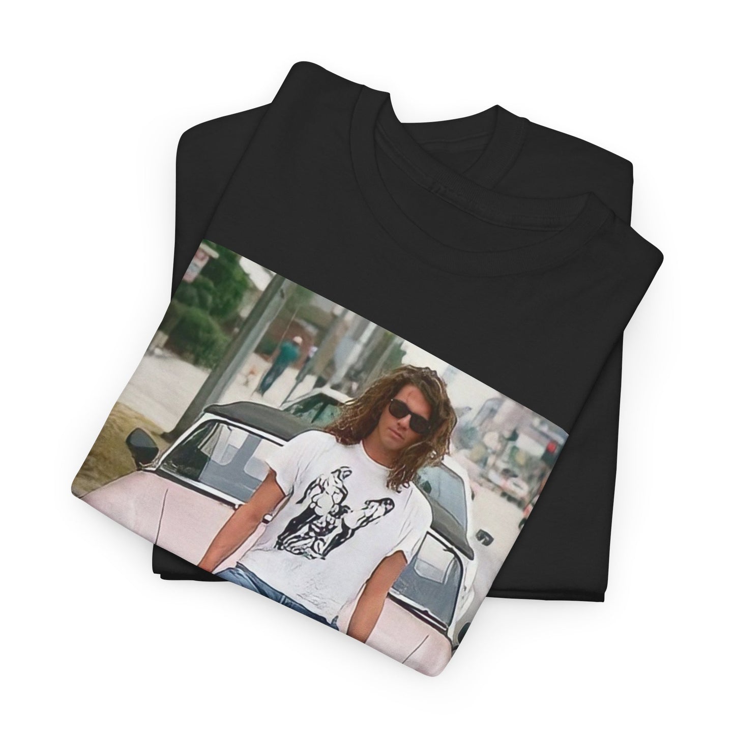 A black graphic t-shirt featuring a vintage photo of INXS band members with a classic car.