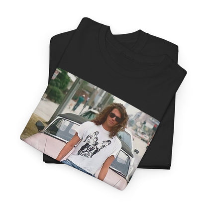 A black graphic t-shirt featuring a vintage photo of INXS band members with a classic car.
